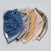 Fabelab Ochre Grid Fold-over Infant & Toddler Feeding Bib. Shown with different color variations.