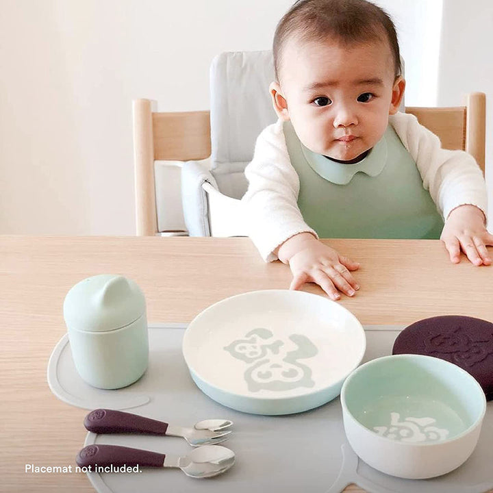Lifestyle image displaying Stokke Soft Mint Munch Snack Pack with snack bag in use during travel.