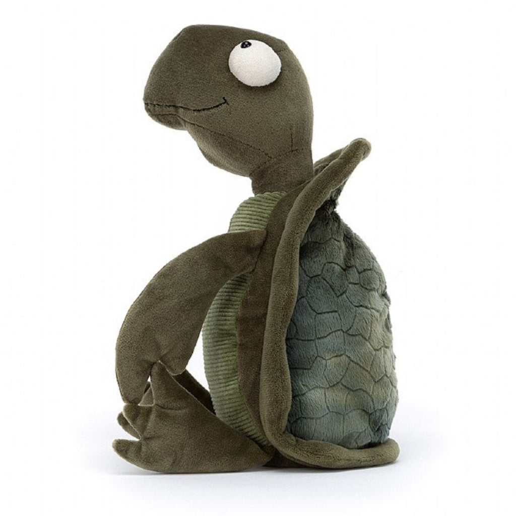 life_style1, Jellycat Tommy Turtle Children's Plush Stuffed Animal Toy smiling turtle with big eyes, corduroy belly, smooth flippers, textured shell. Dark and deep green hues.