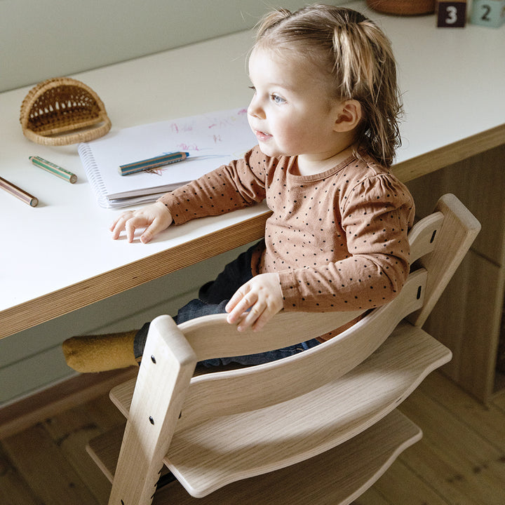 Add charm with the Stokke Tripp Trapp High Chair with Baby Set Natural a stylish pick for wood high chairs