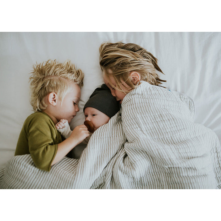 Delicate and timeless, the Little Unicorn Muslin Quilt in Grey Stripe makes the best baby blankets for gifting.