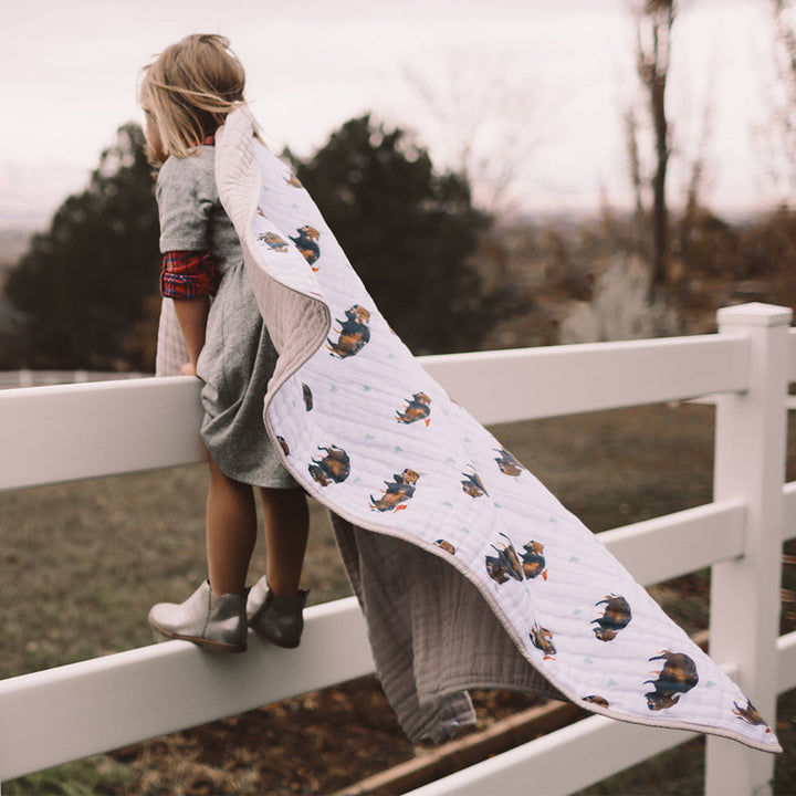 Adventurous and cute, the Little Unicorn Muslin Quilt in Bison is the ultimate baby boy blanket.