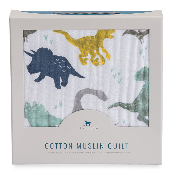 Celebrate the season with the Little Unicorn Muslin Quilt in Dino Friends, a cozy baby sleeping blanket.
