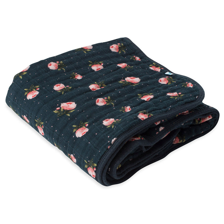 The Little Unicorn Muslin Quilt in Midnight Rose blends soft blooms and cozy texture for baby girl blanket comfort.