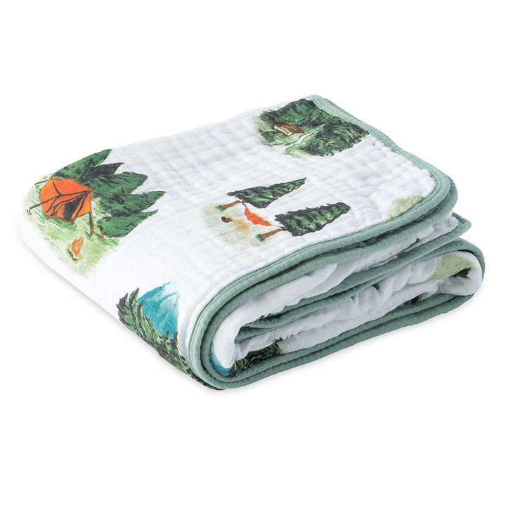 Little Unicorn Muslin Quilt in Happy Camper creates timeless comfort with soft layers of muslin baby blankets.