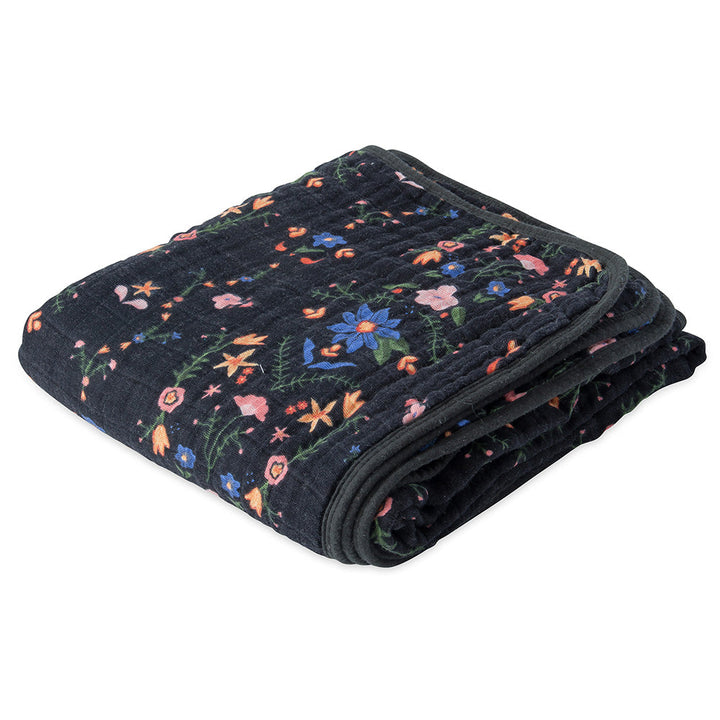 Little Unicorn Muslin Quilt in Floral Stitch adds cheerful pops of color to everyday snuggles with baby girl blankets.