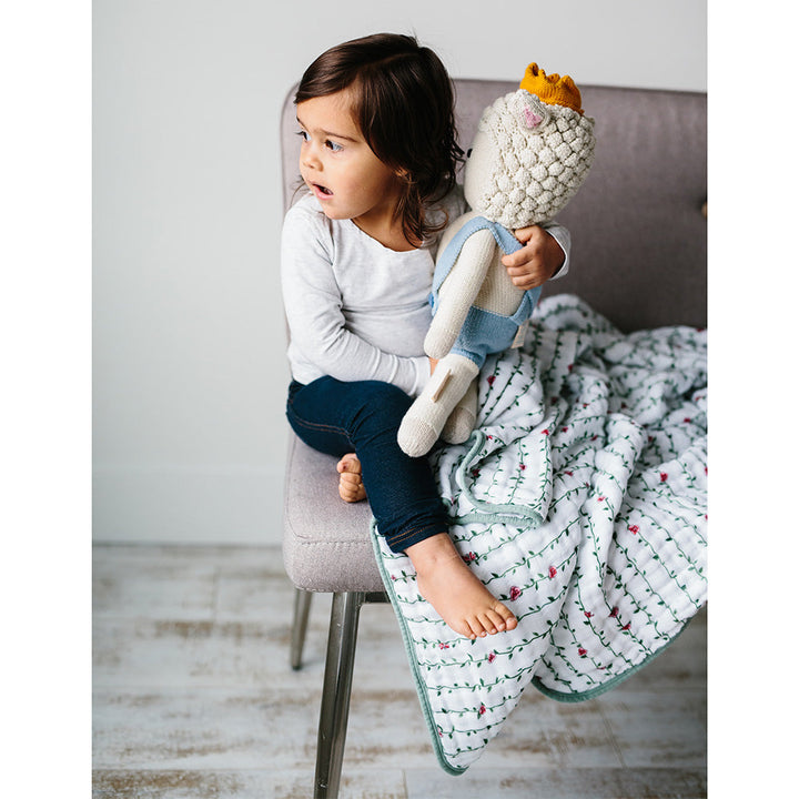Soft and breathable, the Little Unicorn Muslin Quilt in Rose Vine makes a lovely organic baby blanket.
