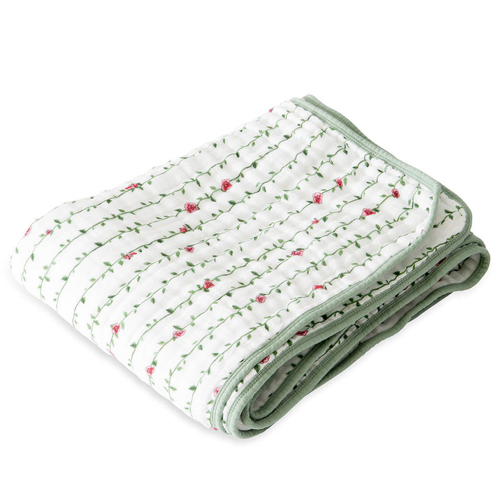 Floral and feminine, the Little Unicorn Muslin Quilt in Rose Vine makes beautiful muslin blankets for baby girls.