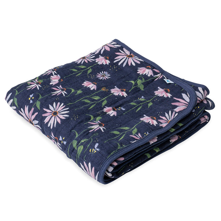 Little Unicorn Muslin Quilt in Dark Cone Flower offers a natural look and feel in a breathable cotton baby blanket.