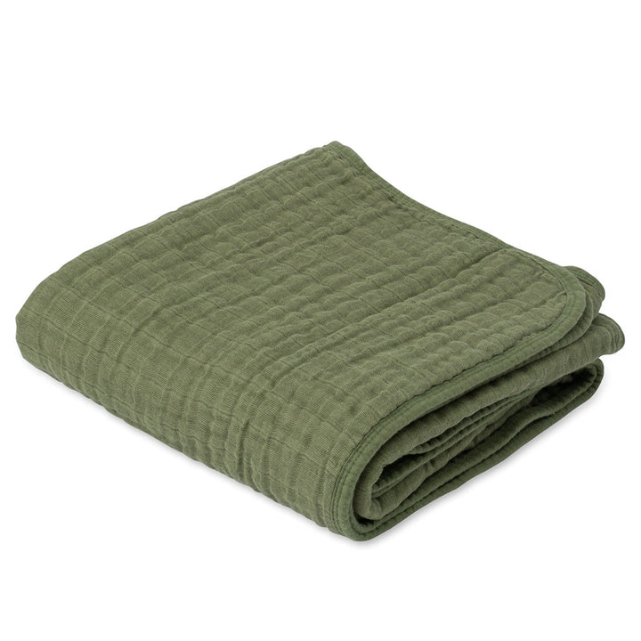 The Little Unicorn Muslin Quilt in Fern surrounds your baby with soft, organic muslin comfort.