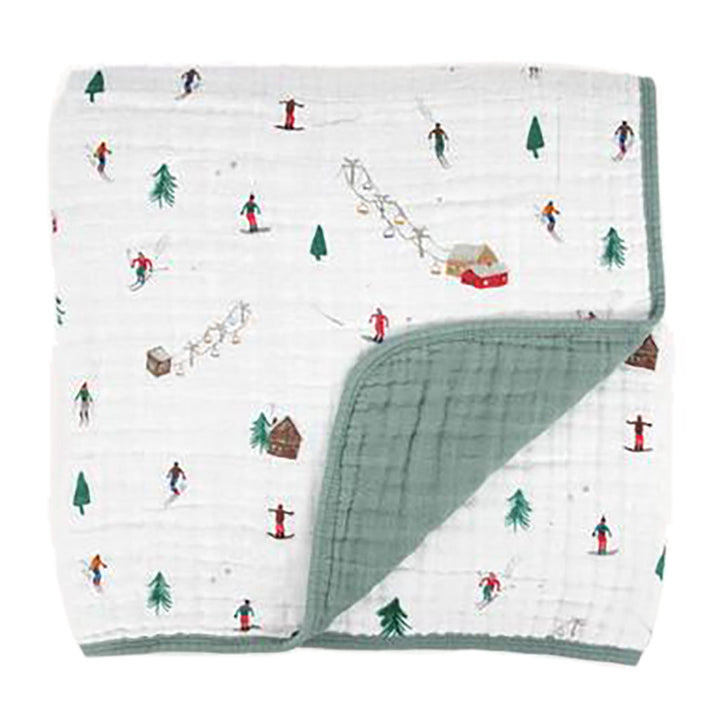 Little Unicorn Muslin Quilt in Powder Party blends ski slope vibes with soft muslin for an organic baby blanket.