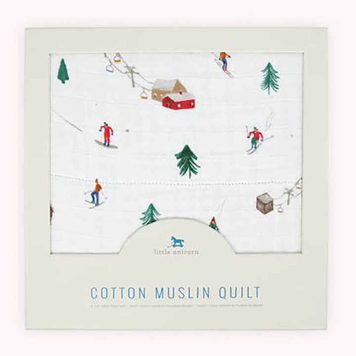 The Little Unicorn Muslin Quilt in Powder Party delivers timeless style in a soft muslin blanket.