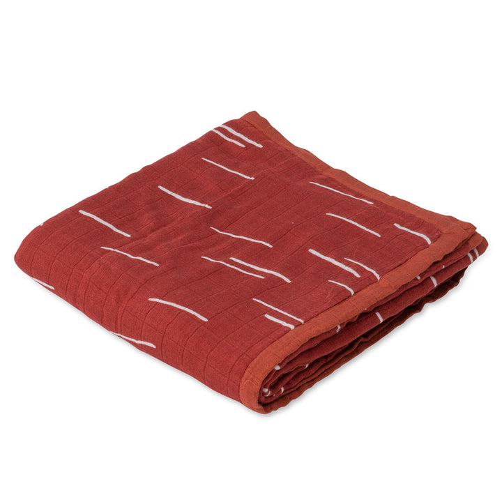 Elevate nursery comfort with the Little Unicorn Deluxe Muslin Quilt - Baked Clay muslin blanket.