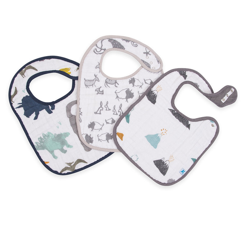 Little Unicorn Dino Friends Classic Cotton Baby Bib featuring fun dinosaur illustrations for babies