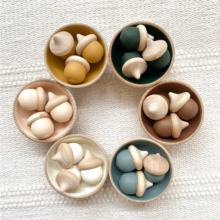 Inspire hands-on play with the Elm & Otter Acorn Sorting Set, a charming wooden toy.