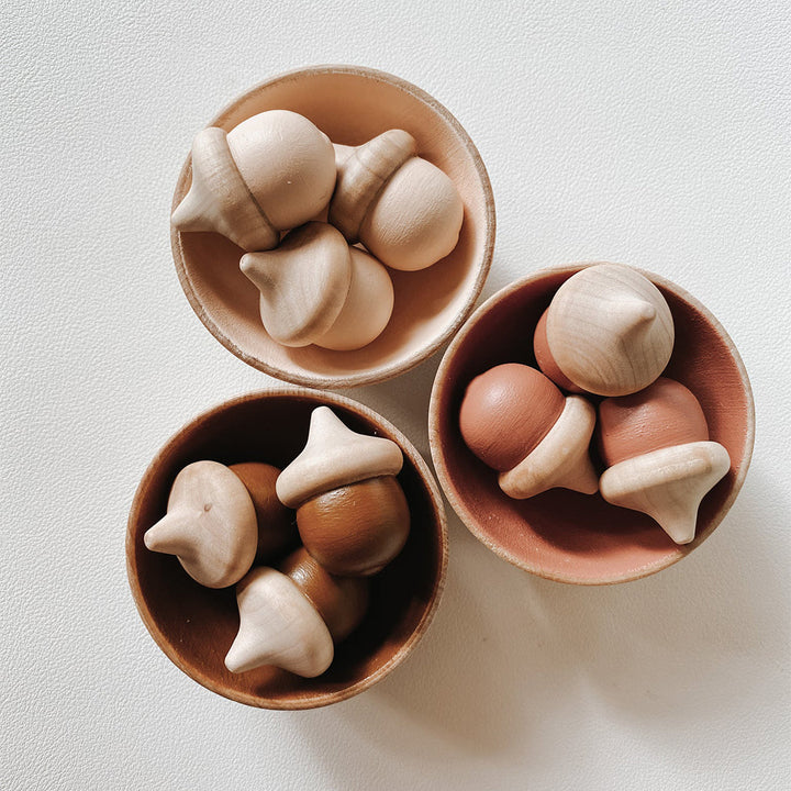 Develop fine motor skills with the Elm & Otter Acorn Sorting Set, a fun educational toy.