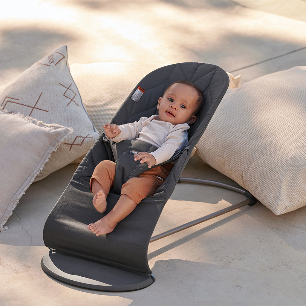infant in BabyBjorn anthracite petal quilt cotton baby bouncer seat