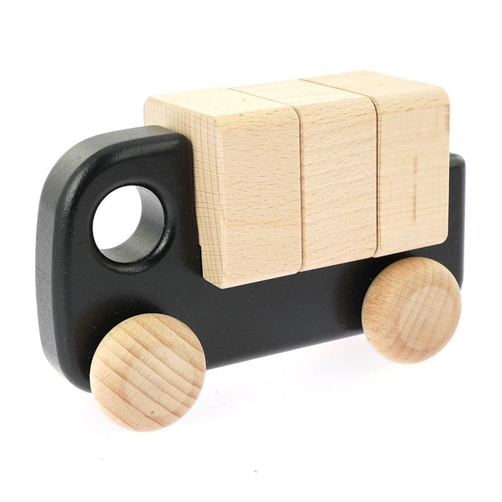 Red BAJO toy car paired with wooden blocks for creative play.