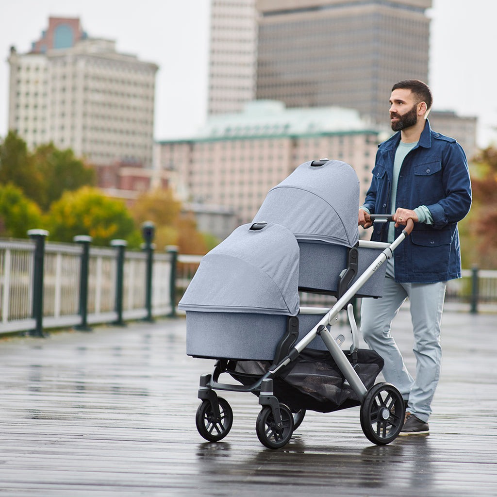 Man walking with Uppababy Double Stroller