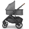 Side View of Uppababy Vista Stroller V2 with Bassinet Accessory in Dark Grey