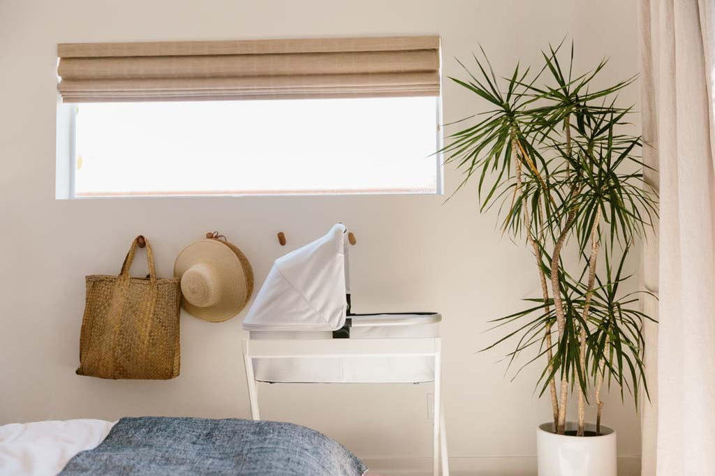 White UPPAbaby Bassinet Stand in Bedroom