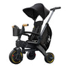 lifestyle_1, Doona Compact Folding Liki Trike S5 black with yellow accents
