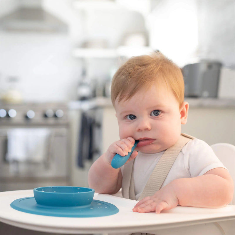 ezpz baby plates and bowls in Blue feature soft silicone for safe and easy feeding.