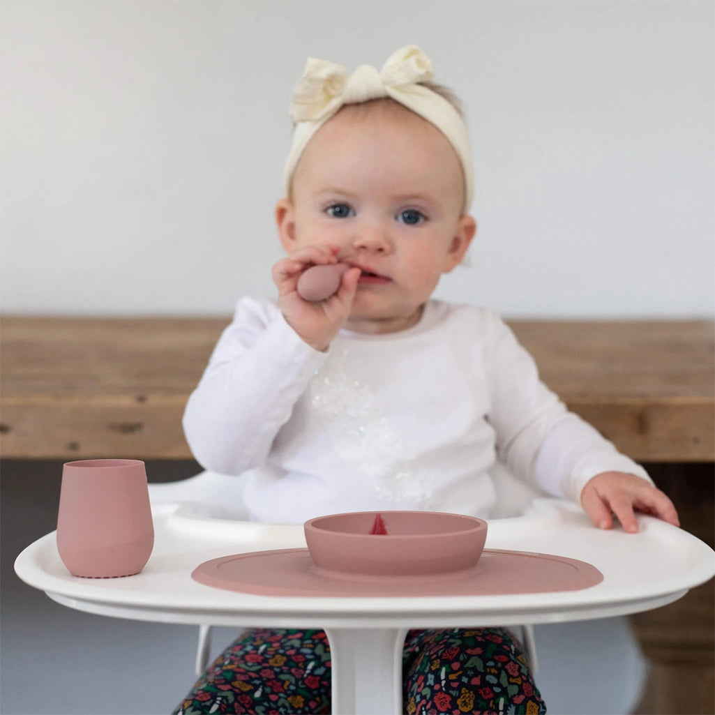 ezpz Blush baby plates and bowls help babies learn to eat independently.