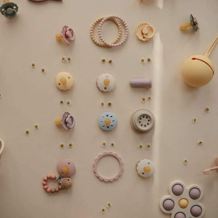 Mushie teether toys for 3-month-olds offering a safe and effective way to soothe teething pain