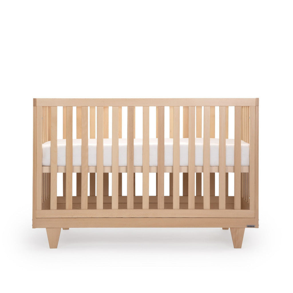 Dadada Natural Cambridge Crib Infant Baby Nursery Furniture front view. mattress raised. Wooden crib