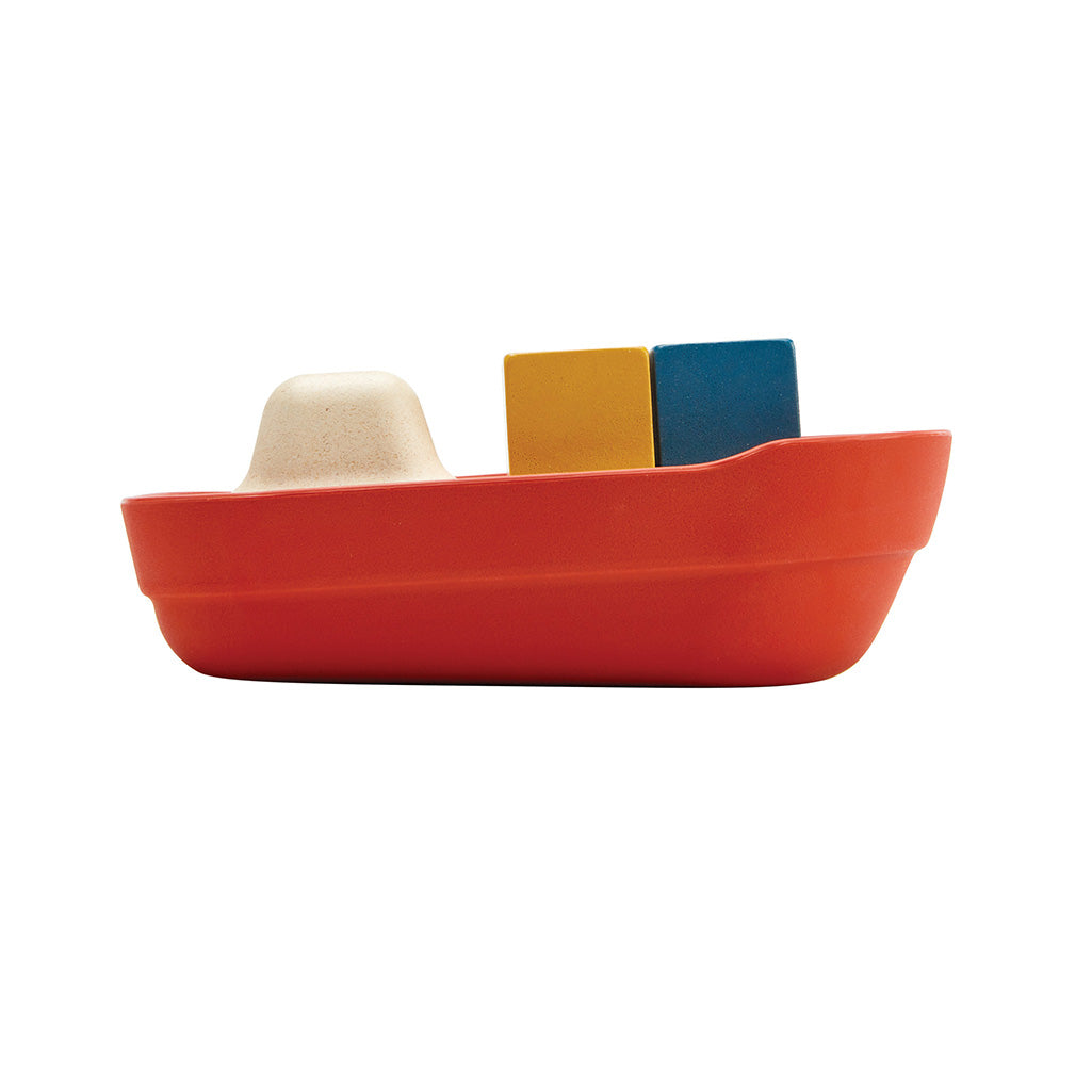 Plan Toys Cargo Ship Eco-Friendly baby bath toys, perfect for safe and sustainable bath time fun for babies.