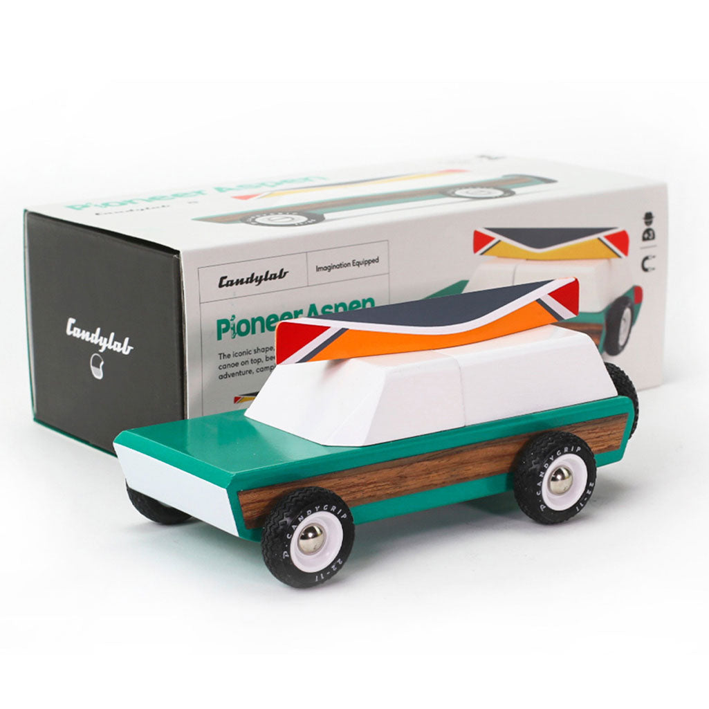 Candylab Pioneer wooden toy car in Aspen Green displayed with its box