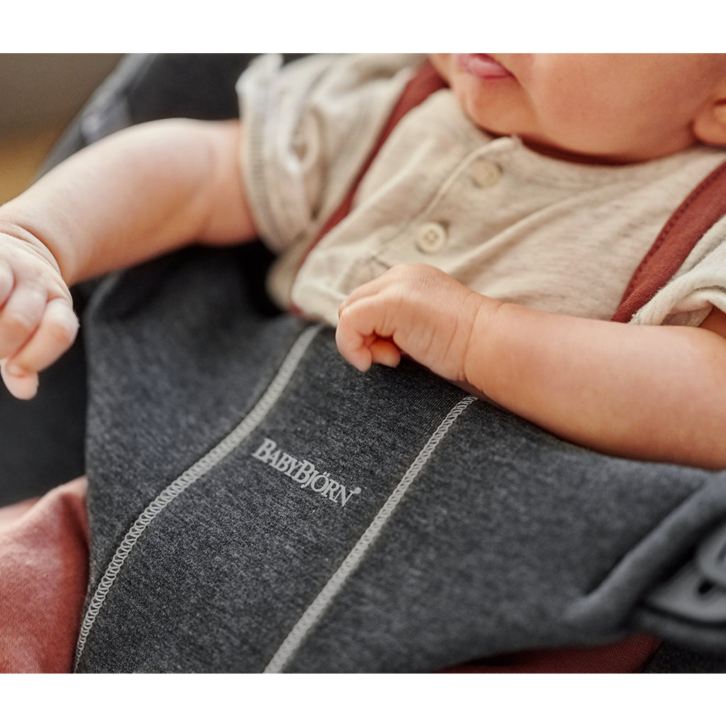 close up of baby in BabyBjorn charcoal jersey baby bjorn bouncer bliss 
