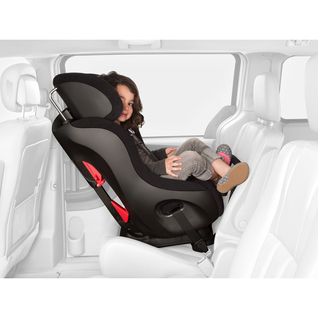 Child in the rear facing position in the Clek Fllo Convertible car seat.