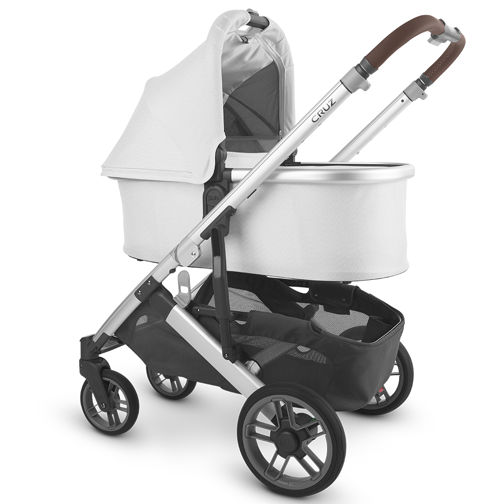 Uppababy Cruz Stroller with baby Bassinet Accessory in White Bryce