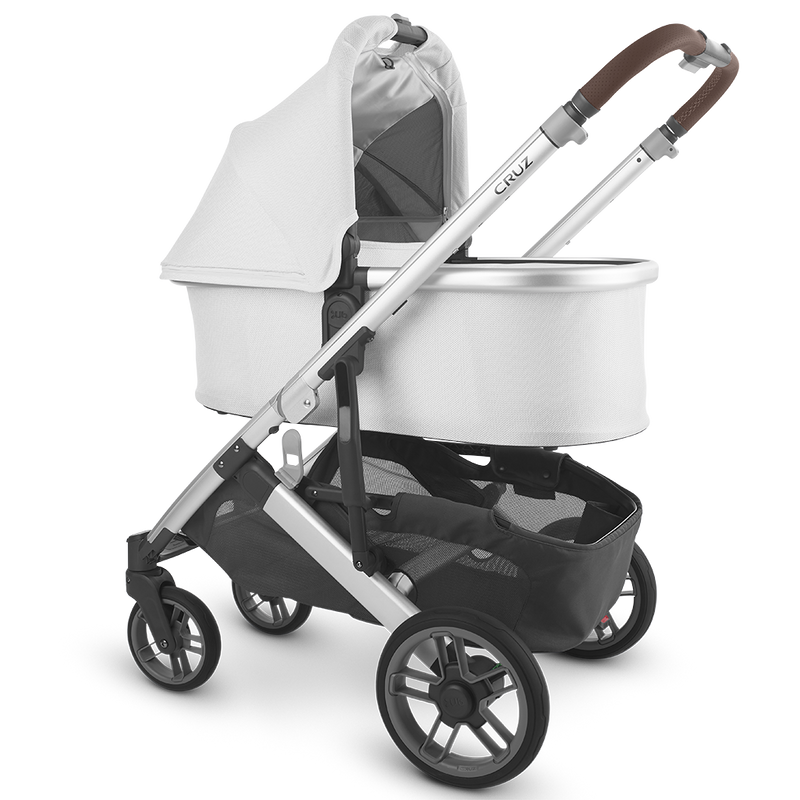 Uppababy Cruz Stroller with baby Bassinet Accessory in White Bryce