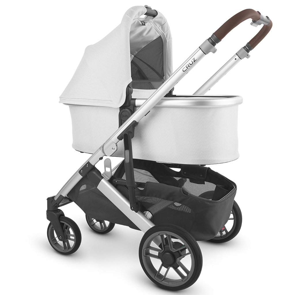 Uppababy Cruz Stroller with Bassinet Accessory in White Bryce