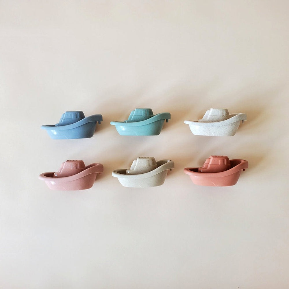 Boat bath toys by Minito & Co designed for toddler water play.