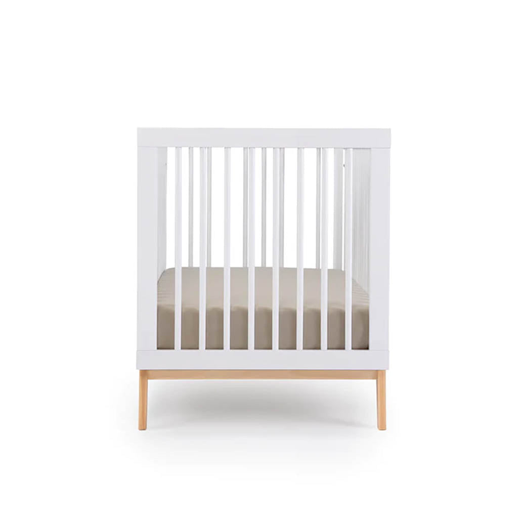 dadada Soho Crib for babies and is convertible for toddlers in the colors white and natural