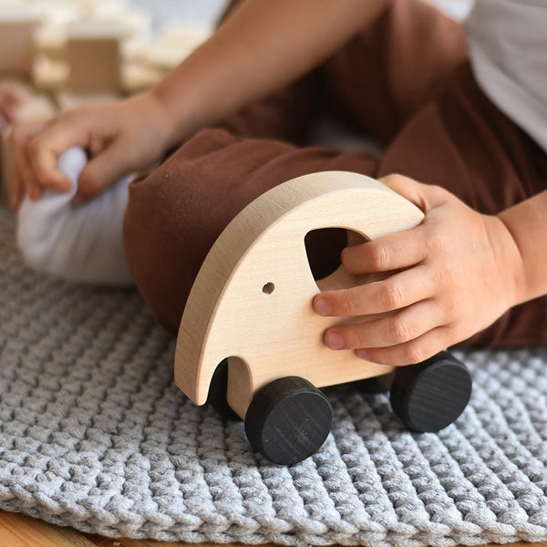 SABO Concept Montessori Toys Wooden Rolling Bear, a beautifully crafted wooden bear toy designed for toddlers to roll around.