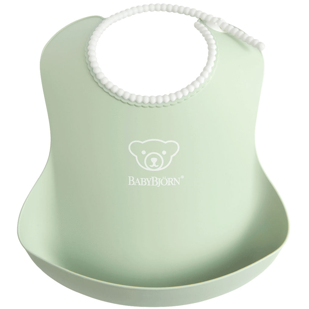 Babybjorn baby bib in green, made for feeding protection from falling food