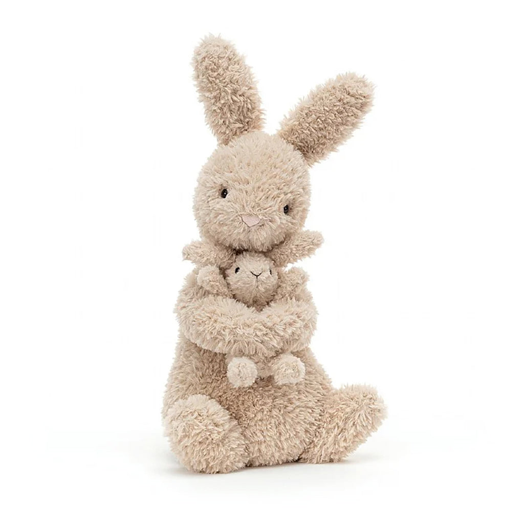 Jellycat Huddles Bunny Children's Plush Stuffed Animal Toy - Bunny gripping tightly onto the baby bunny while sitting and facing the camera
