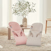 babyBjorn bouncer bliss pink and cream displayed in living area