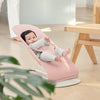 baby facing forward in light pink jersey baby bjorn bouncer seat