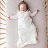 Baby Sleeping in KyteBaby Sleep Sack in Cloud White