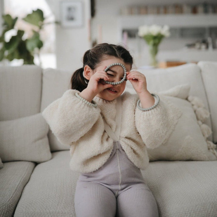 Mushie teething toys for infants with ergonomic shapes for a perfect grip and ease of use