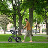 Man pushing Stroller with Uppababy Infant Car Seat Mesa