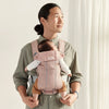 dad holding baby in Pink free baby bjorn carrier