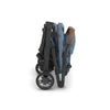 Folded view of Uppababy stroller in blue