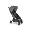 Right side of Uppababy stroller in grey with partial sunshade